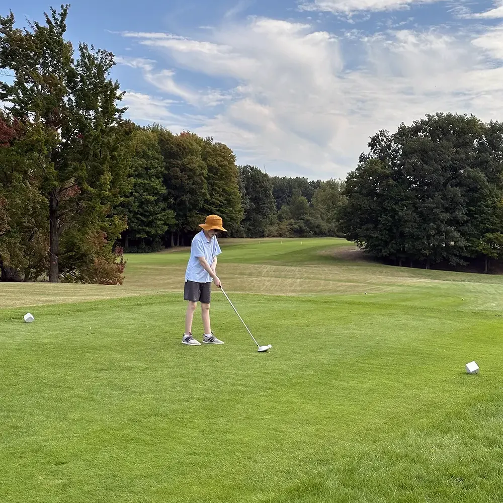 Junior teeing off at Lakeside Links Golf Club in Ludington, MI